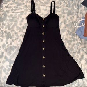black dress with buttons.